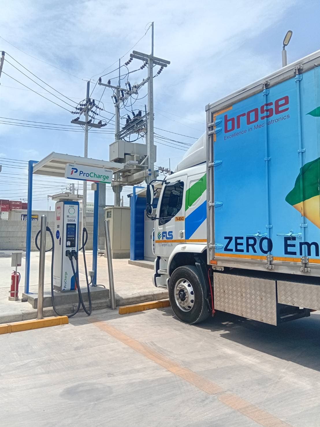 A ProCharge DC charger, charging an FLS Transport electric truck at the Laem Chabang public charging station