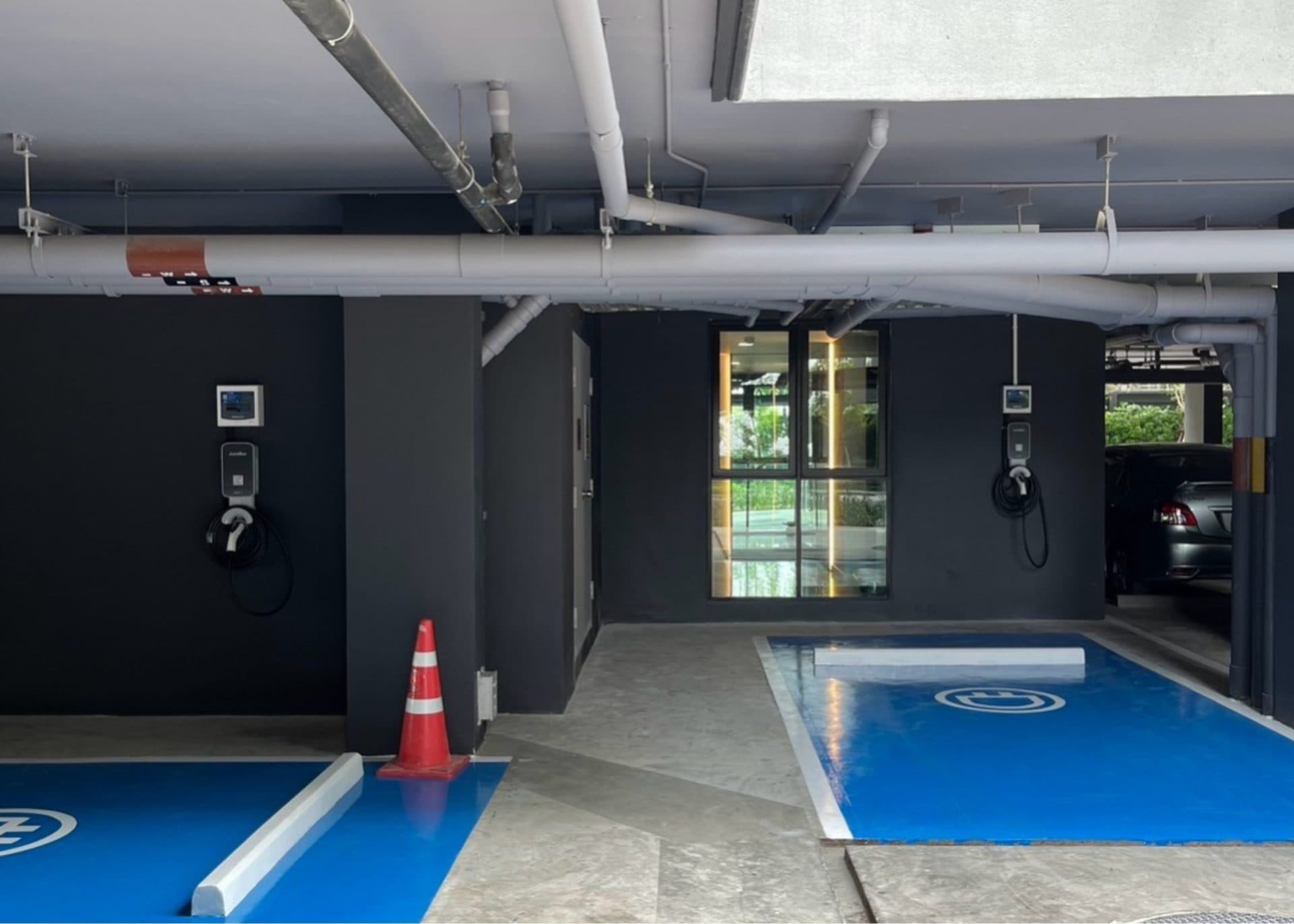 EV charging bays in a condominium's underground parking garage
